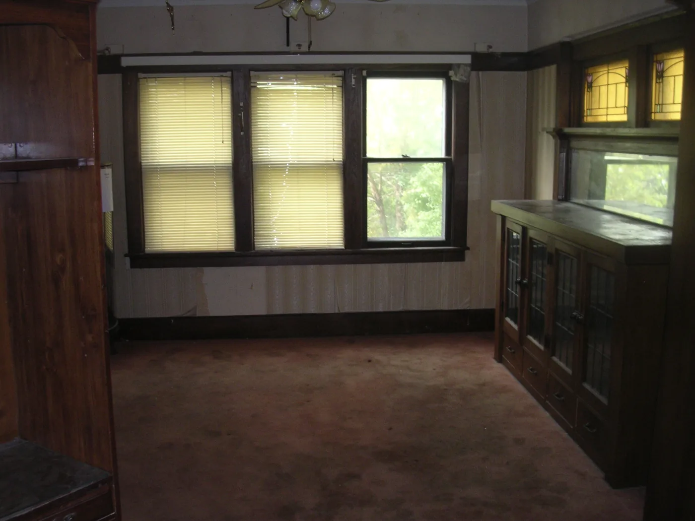 After — the same room, cleared, cleaned, and restored